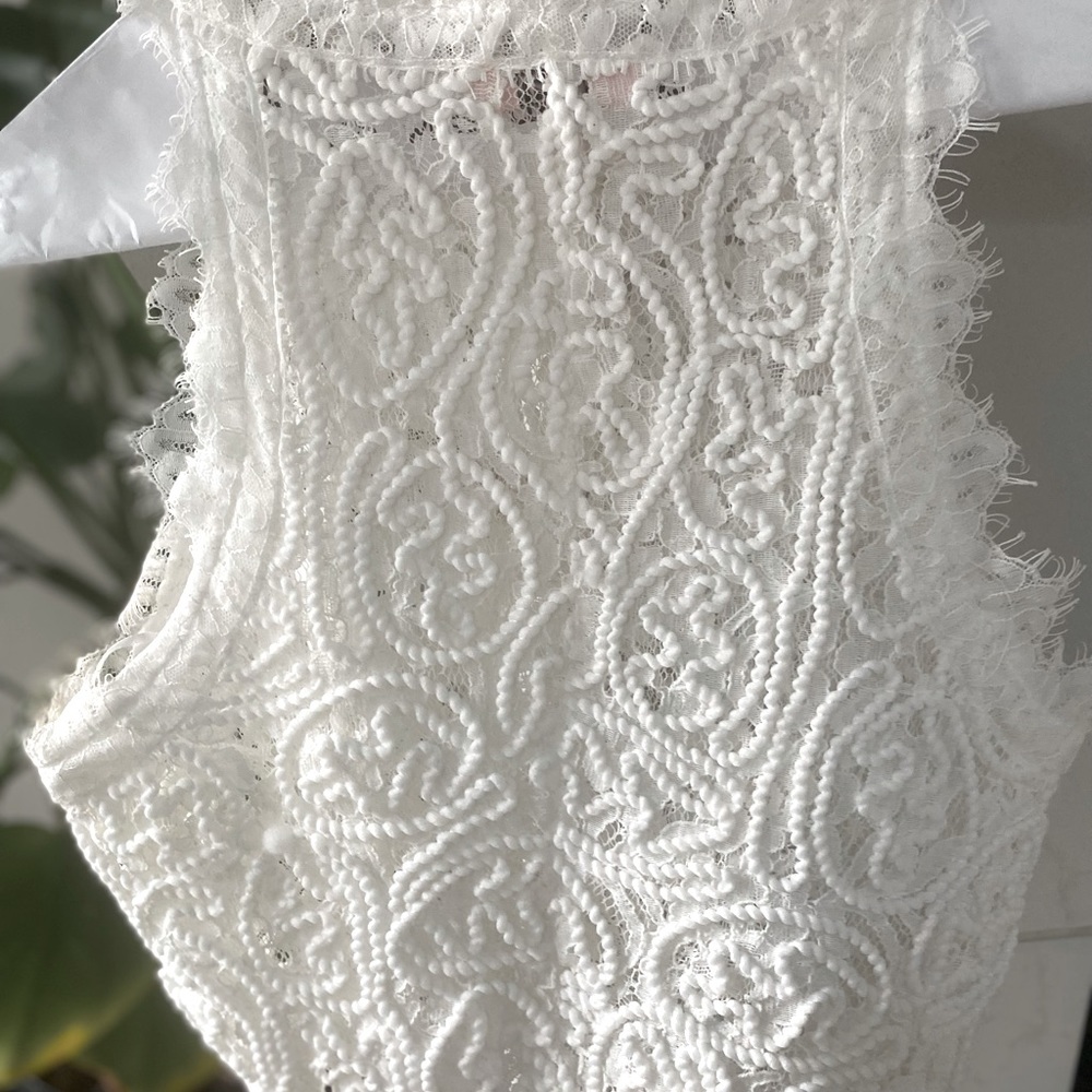 A. Peach white lace high neck crop top with scalloped edges. Size  S